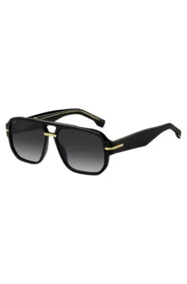 Gafas de sol de acetato negro con detalles en tono dorado 