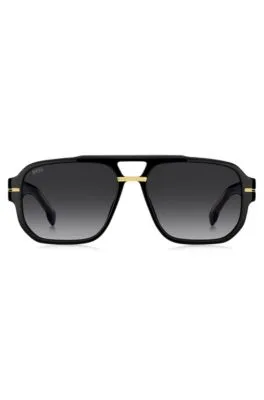 Gafas de sol de acetato negro con detalles en tono dorado 