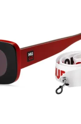 Gafas de sol de acetato negro y rojo con eslóganes en la correa desmontable