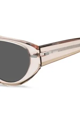 Gafas de sol de bioacetato rosa traslúcido con detalles estampados