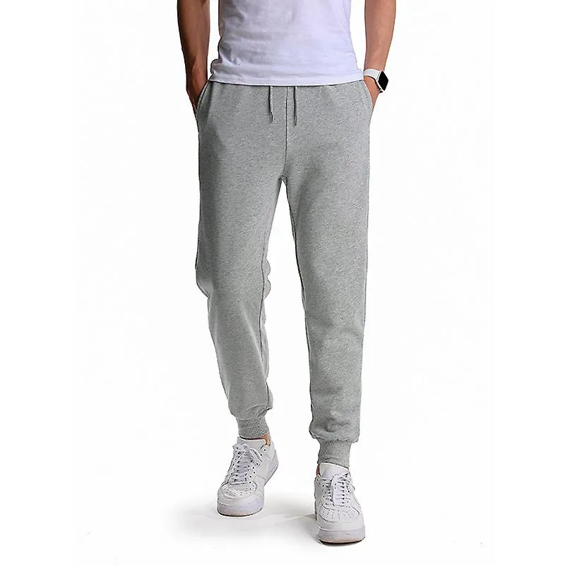 Hombres Casual Solid Color Sweatpants Two Pockets Sports Jogging Pantalones largos