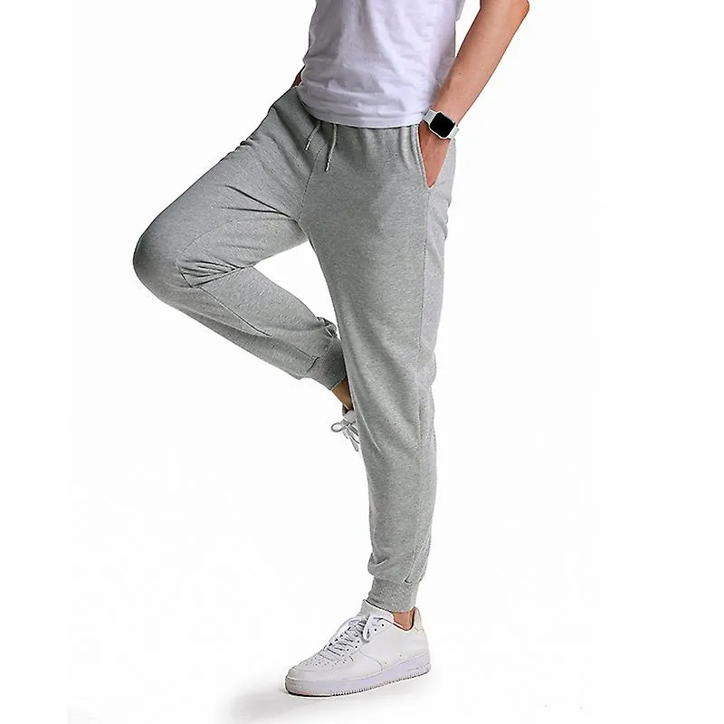 Hombres Casual Solid Color Sweatpants Two Pockets Sports Jogging Pantalones largos