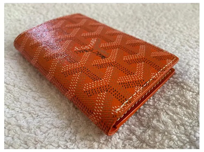 Tarjetero naranja Goyard 