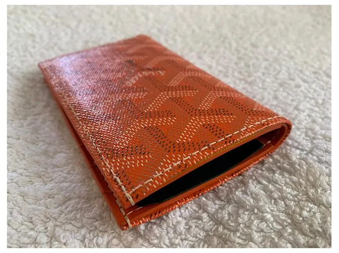 Tarjetero naranja Goyard 